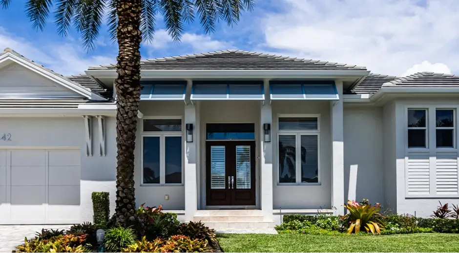 Florida home with impact-resistant windows and doors installed to meet building code requirements