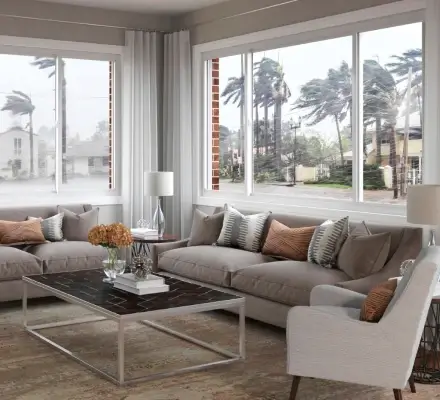 Interior view of impact-resistant windows protecting a Florida home during a hurricane